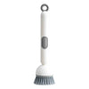 Brosse vaisselle avec réservoir