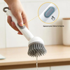 Brosse vaisselle avec réservoir