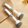 Brosse vaisselle avec réservoir